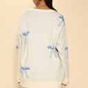  BLUE All over bow cardigan