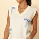  All over bow knit vest