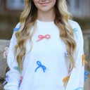 Cream Small All over Bow knit sweater