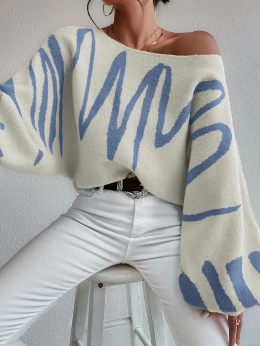 Stay cozy and chic with this oversized balloon sleeve sweater