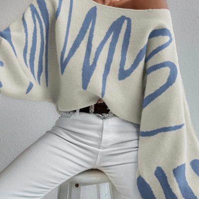 Stay cozy and chic with this oversized balloon sleeve sweater