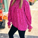  HIDDEN GEMS Leopard Smocked Flowy Blouse