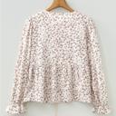  Moonflower Peplum Bow Blouse