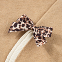  HIDDEN GEMS | Leopard Bow Split Cuff Sweater