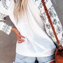  Embroidered Split Neck Blouse