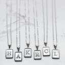 A Silver Plated Mother of Pearl Initial Letter Necklace