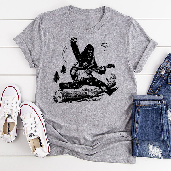 Bigfoot Playing The Guitar And Jumping Over Log Music Graphic Tee