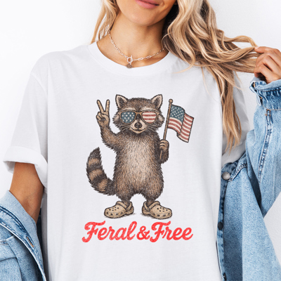 Feral And Free Funny Raccoon USA Patriotic 4th Of July America Graphic Tee | 4th Of July Tee
