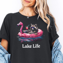  Raccoon & Flamingo Floaty Funny Lake Life Summer Feral Animal Graphic Tee | Summer Tee