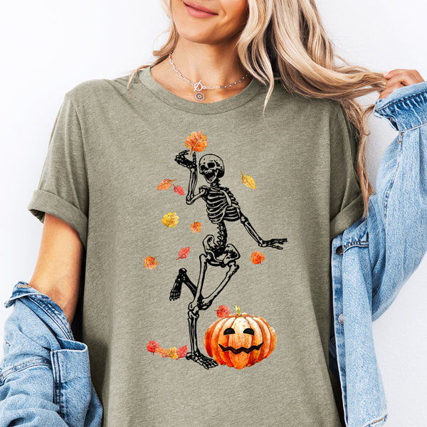 Skeleton Playing With Falling Leaves Autumn Halloween Graphic Tee