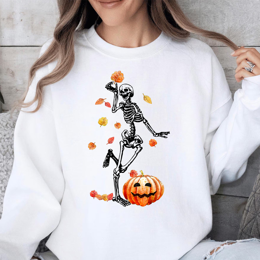 Skeleton Dancing Under The Falling Autumn Leaves With Pumpkin Halloween Graphic Sweatshirt