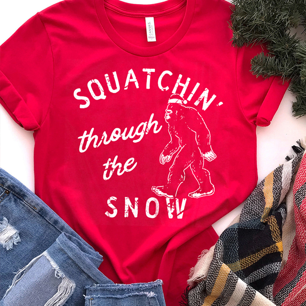 Squatchin' Through The Snow Funny Bigfoot Christmas Graphic Tee