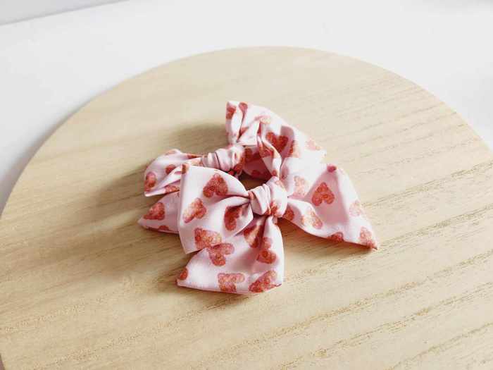 SET OF TWO kids Hand Tied Piggie Bows