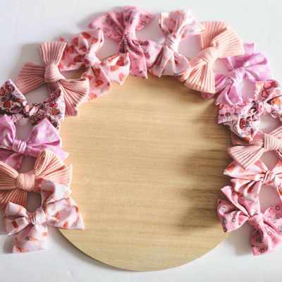 SET OF TWO kids Hand Tied Piggie Bows