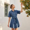  Belted Denim Mini Dress with Button Front Detail Short Sleeves Front Pocket Accents Flattering Fit and Flare Silhouette