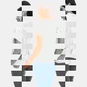 Medium Soft Knit Short Sleeve Button Front Cardigan Top with Relaxed Draped Silhouette Lightweight Feel Flattering V Neckline Versatile Layering Piece for Casual Everyday Comfortable Style