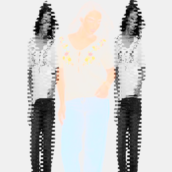 Embroidered Knit Top with Floral Detailing Tie Front V Neckline Soft Lightweight Feel Short Sleeves and Feminine Relaxed Silhouette Perfect for Casual Outings Brunch and Effortless Everyday Style