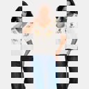  Embroidered Knit Top with Floral Detailing Tie Front V Neckline Soft Lightweight Feel Short Sleeves and Feminine Relaxed Silhouette Perfect for Casual Outings Brunch and Effortless Everyday Style