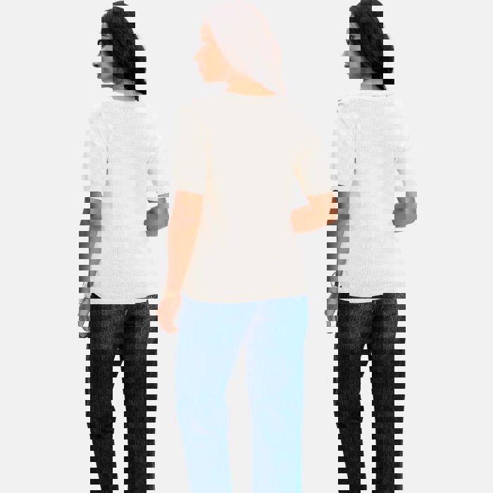 Embroidered Knit Top with Floral Detailing Tie Front V Neckline Soft Lightweight Feel Short Sleeves and Feminine Relaxed Silhouette Perfect for Casual Outings Brunch and Effortless Everyday Style