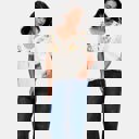 Medium Embroidered Knit Top with Floral Detailing Tie Front V Neckline Soft Lightweight Feel Short Sleeves and Feminine Relaxed Silhouette Perfect for Casual Outings Brunch and Effortless Everyday Style