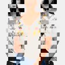 Small Embroidered Knit Top with Floral Detailing Tie Front V Neckline Soft Lightweight Feel Short Sleeves and Feminine Relaxed Silhouette Perfect for Casual Outings Brunch and Effortless Everyday Style