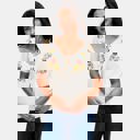 Small Embroidered Knit Top with Floral Detailing Tie Front V Neckline Soft Lightweight Feel Short Sleeves and Feminine Relaxed Silhouette Perfect for Casual Outings Brunch and Effortless Everyday Style