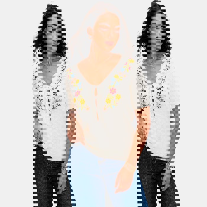 Embroidered Knit Top with Floral Detailing Tie Front V Neckline Soft Lightweight Feel Short Sleeves and Feminine Relaxed Silhouette Perfect for Casual Outings Brunch and Effortless Everyday Style