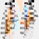 Medium Mixed Print Quilted Jacket with Colorblock Patchwork Design Soft Lightly Padded Feel Front Pockets Contrast Binding and Stylish Statement