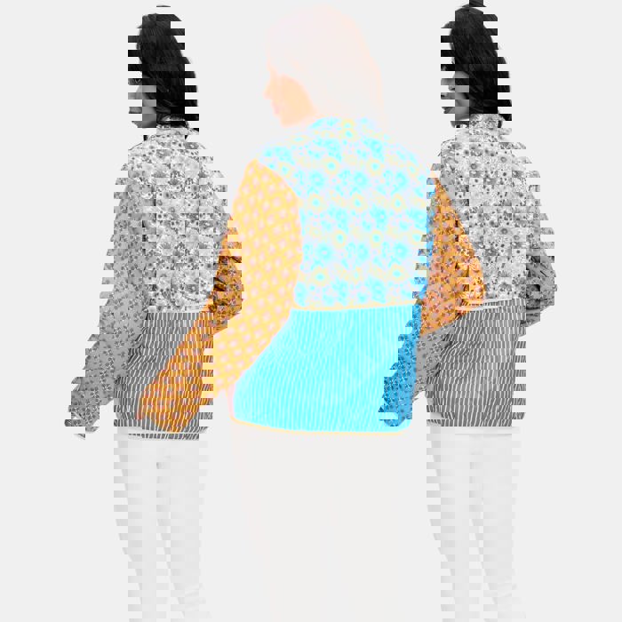 Mixed Print Quilted Jacket with Colorblock Patchwork Design Soft Lightly Padded Feel Front Pockets Contrast Binding and Stylish Statement