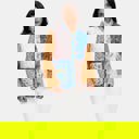 Medium Mixed Print Quilted Jacket with Colorblock Patchwork Design Soft Lightly Padded Feel Front Pockets Contrast Binding and Stylish Statement