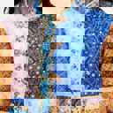 Small Mixed Print Quilted Jacket with Colorblock Patchwork Design Soft Lightly Padded Feel Front Pockets Contrast Binding and Stylish Statement