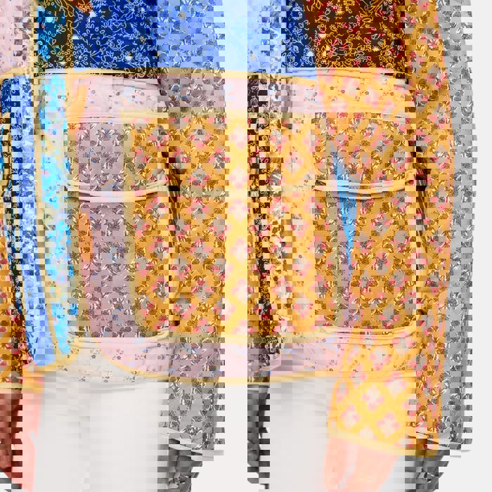 Mixed Print Quilted Jacket with Colorblock Patchwork Design Soft Lightly Padded Feel Front Pockets Contrast Binding and Stylish Statement