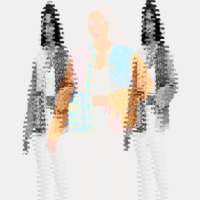 Mixed Print Quilted Jacket with Colorblock Patchwork Design Soft Lightly Padded Feel Front Pockets Contrast Binding and Stylish Statement