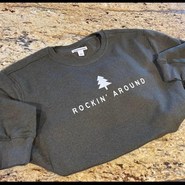 Rockin Around Sweatshirt spruce color with white font 