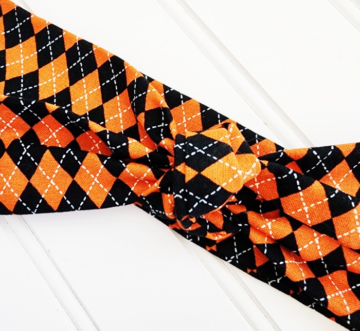 Donna Knotted Headband - Orange and Black Argyle