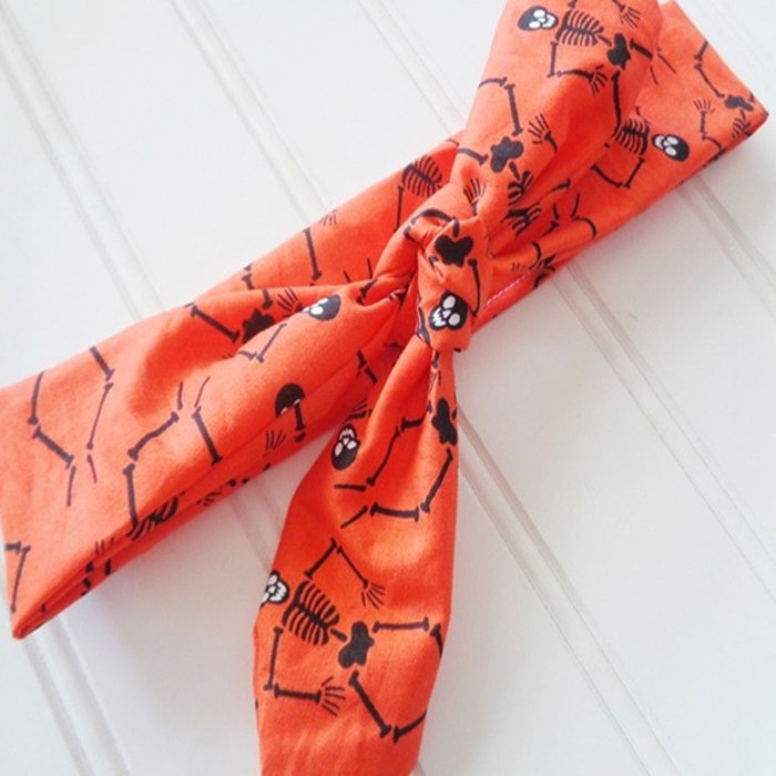 Donna Knotted Headband - Skeletons on Orange