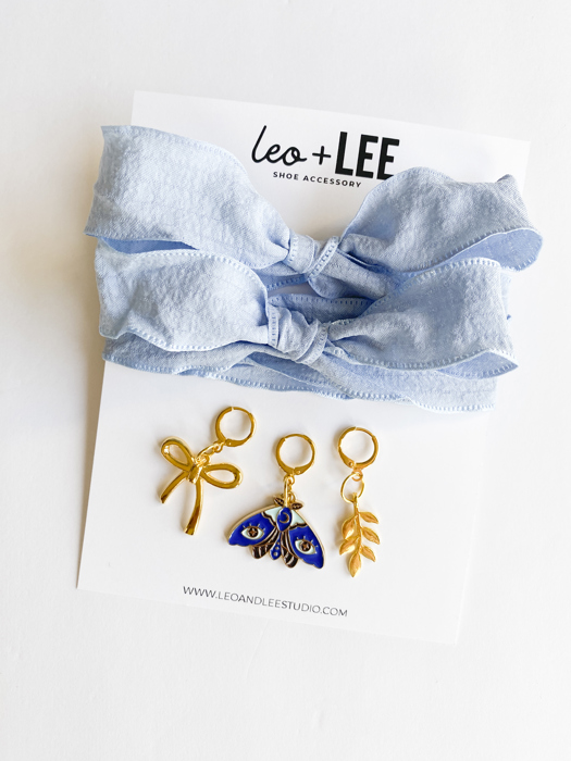 Blue Shoe Laces with Fern, Butterfly & Bow Shoe Charm Set
