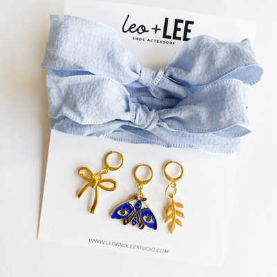 Blue Shoe Laces with Fern, Butterfly & Bow Shoe Charm Set