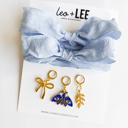  Blue Shoe Laces with Fern, Butterfly & Bow Shoe Charm Set