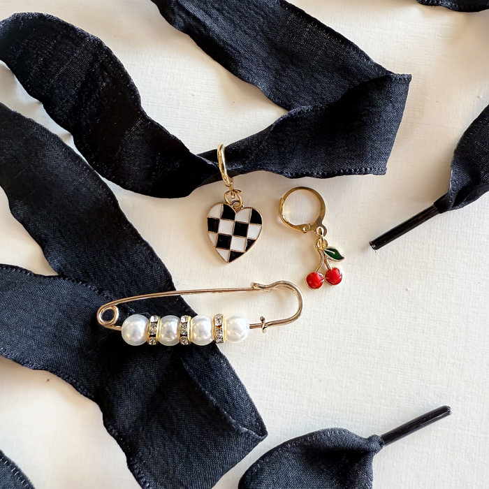 Sneaker and Charm Lace Set with Black Laces and Attachable Charms