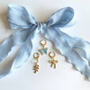  Blue Shoe Laces with Fern, Butterfly & Bow Shoe Charm Set