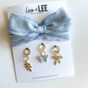  Blue Shoe Laces with Fern, Butterfly & Bow Shoe Charm Set