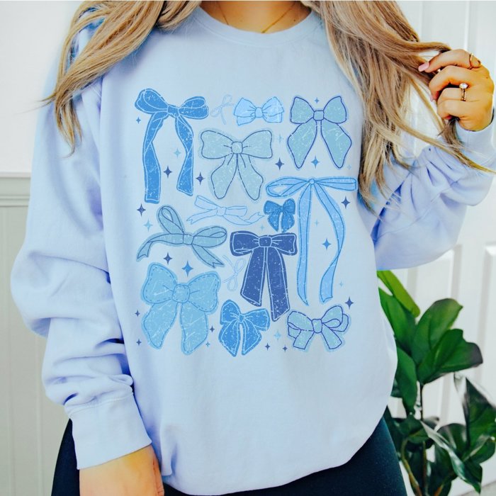 Winter Blue Bow Collage Graphic Sweatshirt