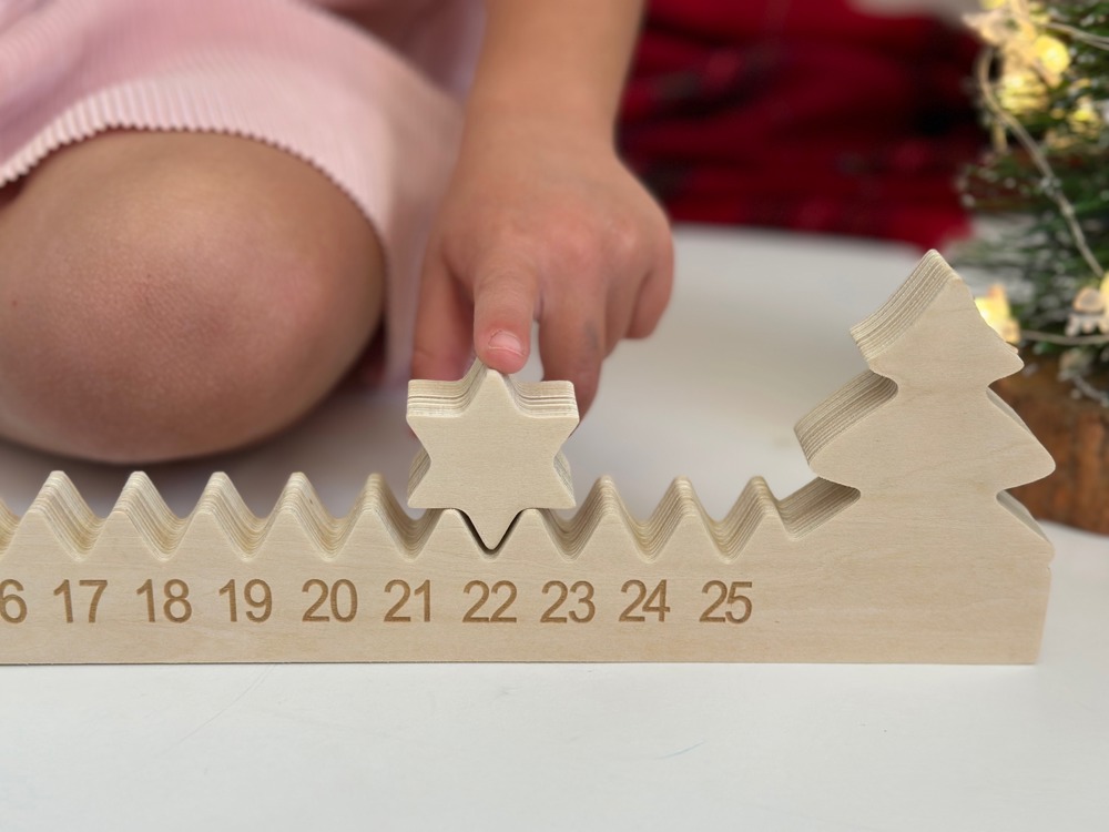 Wooden Advent Calendar Countdown to Christmas with star and Christmas tree