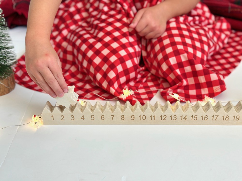 Wooden Advent Calendar Countdown to Christmas with star and Christmas tree