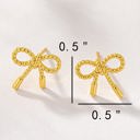  Very Carrot Small textured brass bow stud earrings