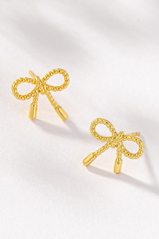 Very Carrot Small textured brass bow stud earrings