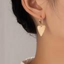  Very Carrot Hammered heart drop on a huggie hoop earrings