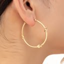  Very Carrot Knotted Grace Hoop Earrings