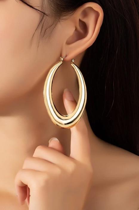 Very Carrot Large puffy hollow oval hoop earrings